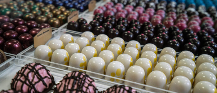 Assortment of handcrafted chocolates on trays