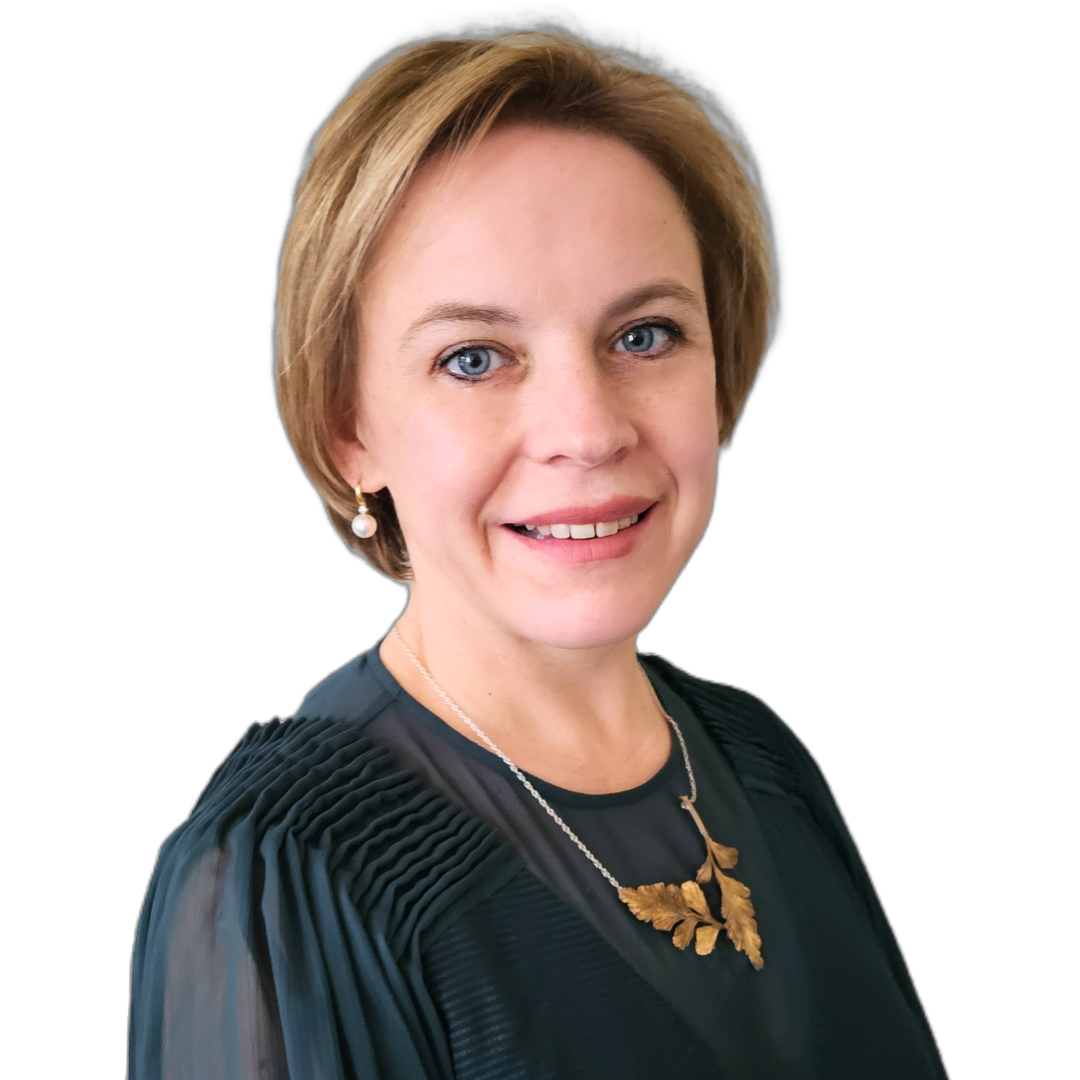 Rayne van den Berg smiling at camera, white background